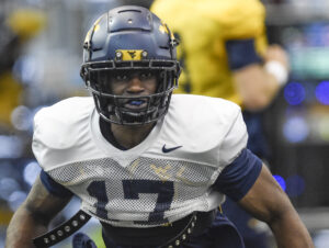 WVU running back Lyn-J Dixon re-enters transfer portal before playing game with Mountaineers